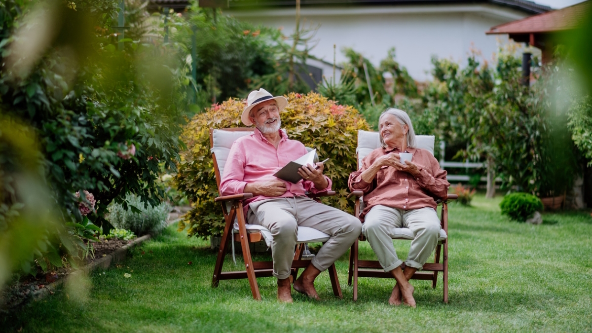 detroit lawn care backyard couple relaxing detroit lawn care backyard couple relaxing